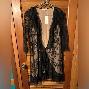 NWT xxs Francesca’s sexy black lace with nude lining wrap dress
